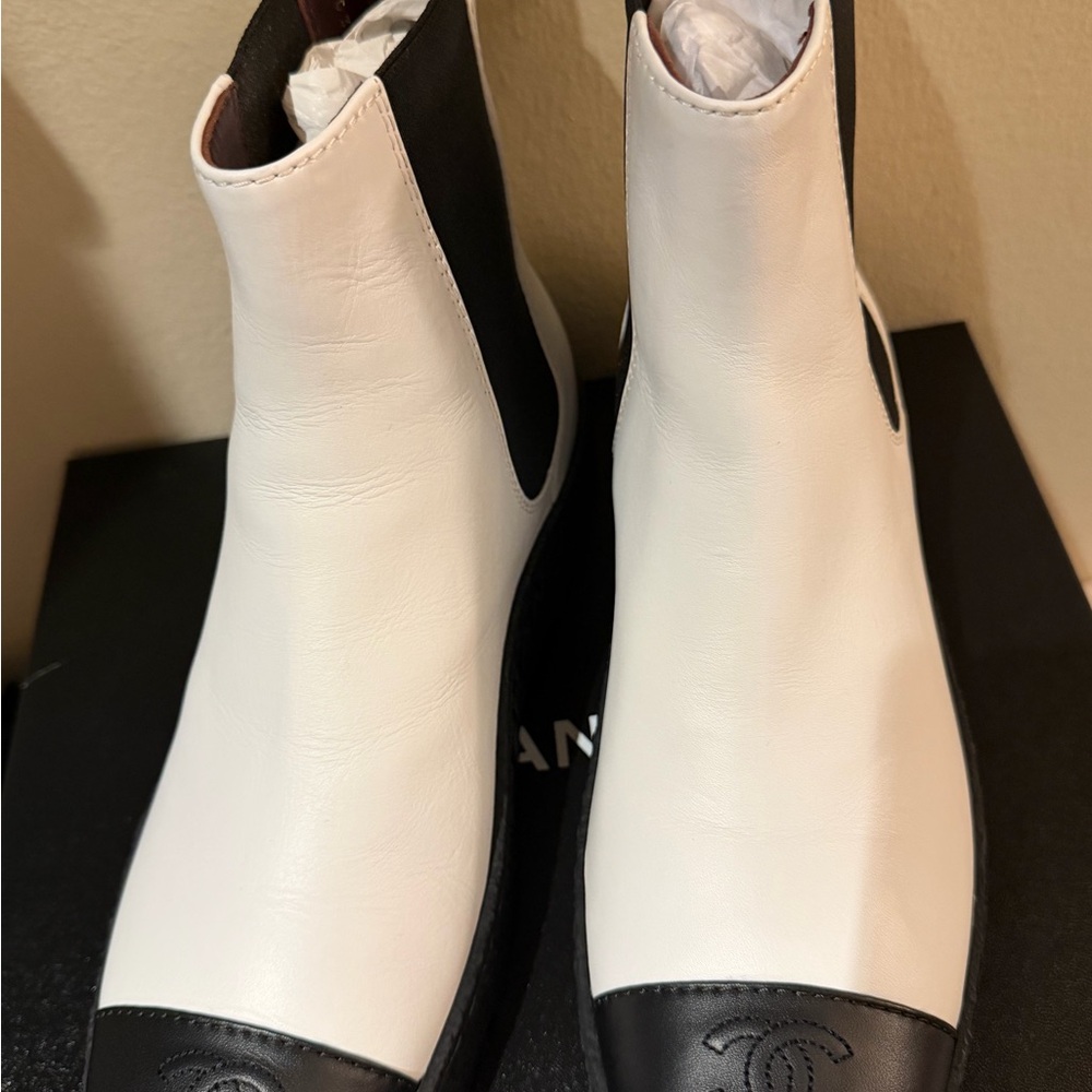 CHANEL Black and White Ankle Boots with Turn Lock